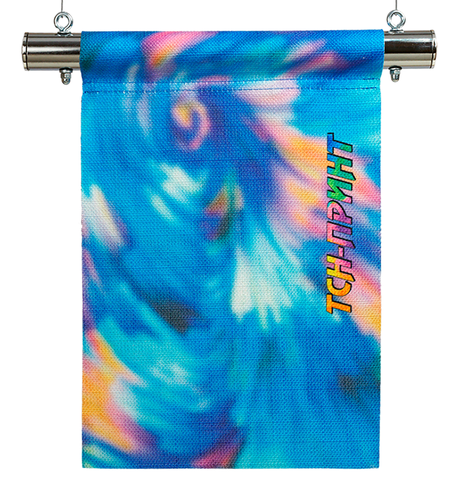 Вид подвески баннера из ткани с крупной фактурой: на стальной, никелированной трубе «Джокер», диаметром 25 мм. с
двумя ушками