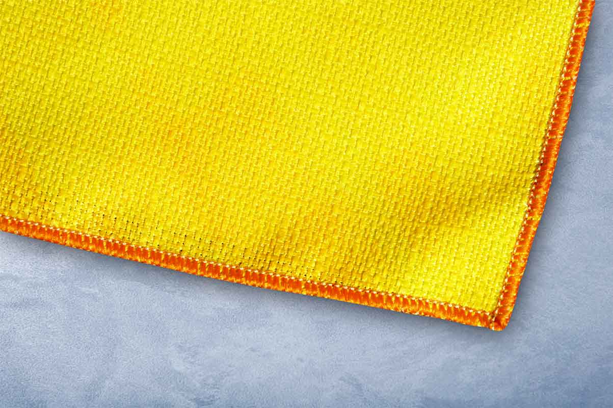 Вариант обметки сервировочных салфеток оверлоком с прямыми углами