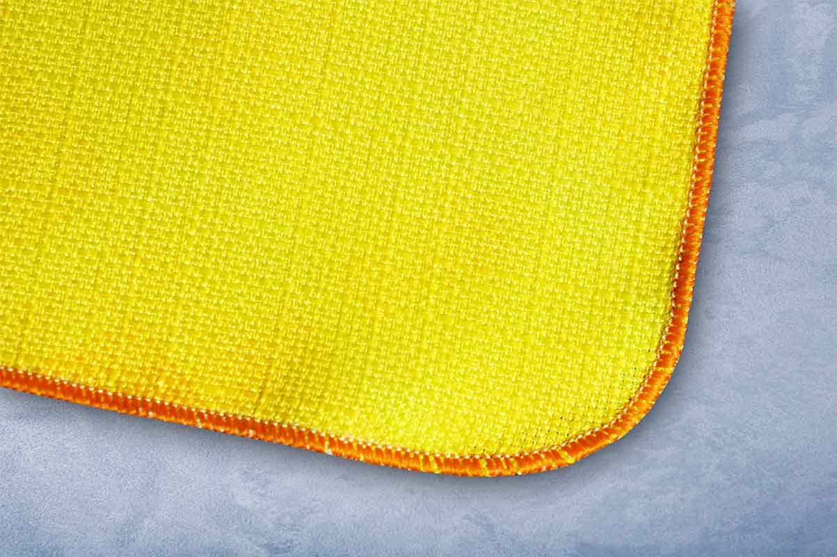 Вариант обметки сервировочных салфеток оверлоком с закруглёнными углами